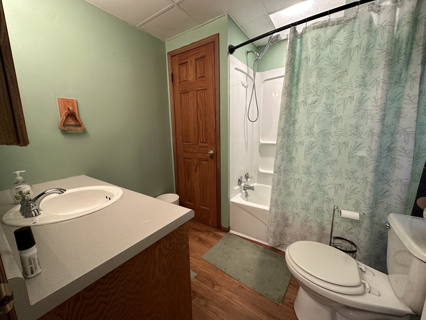 624 West Lincolnway Road Morrison, IL 61270 - Photo 15 of 26 a bathroom with a sink a toilet a mirror and shower