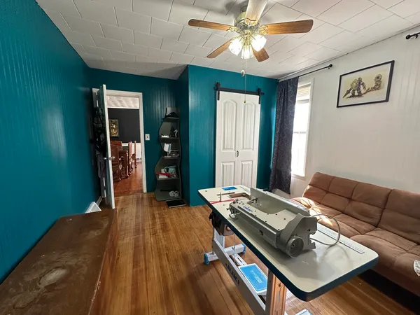 a living room with furniture and a table