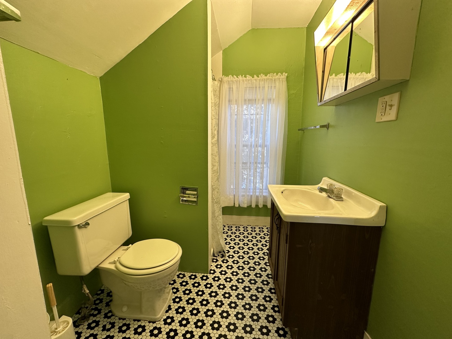 624 West Lincolnway Road Morrison, IL 61270 - Photo 19 of 26 a bathroom with a sink and a toilet