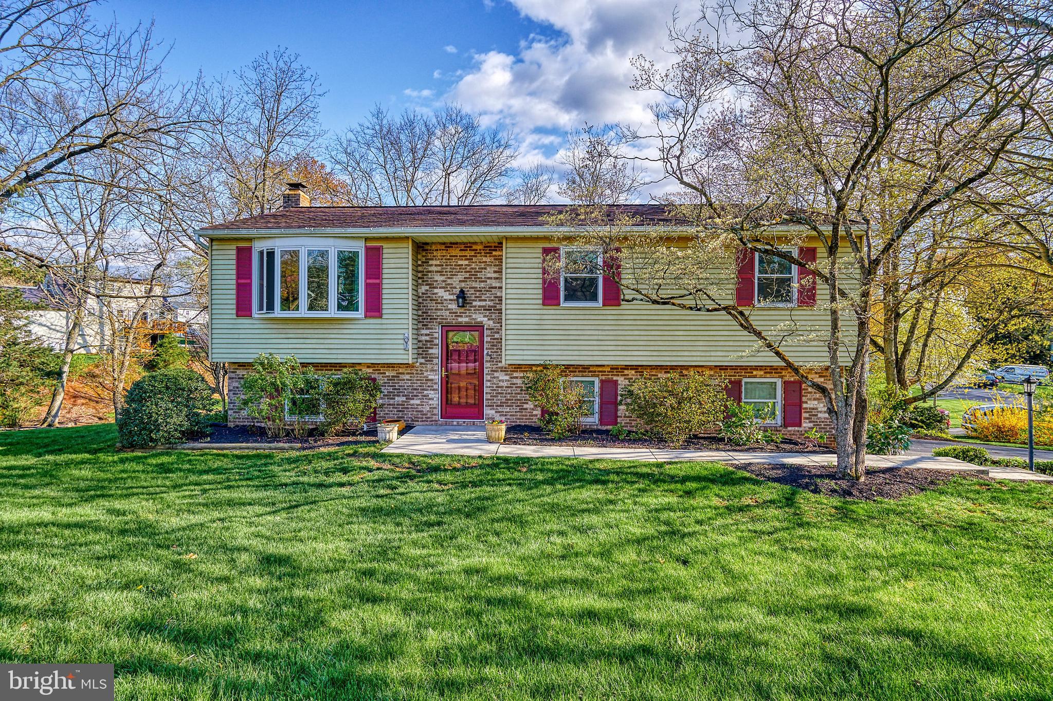 45 Sam Snead Circle Etters, PA 17319 - Photo 2 of 34 a front view of house with yard and play ground