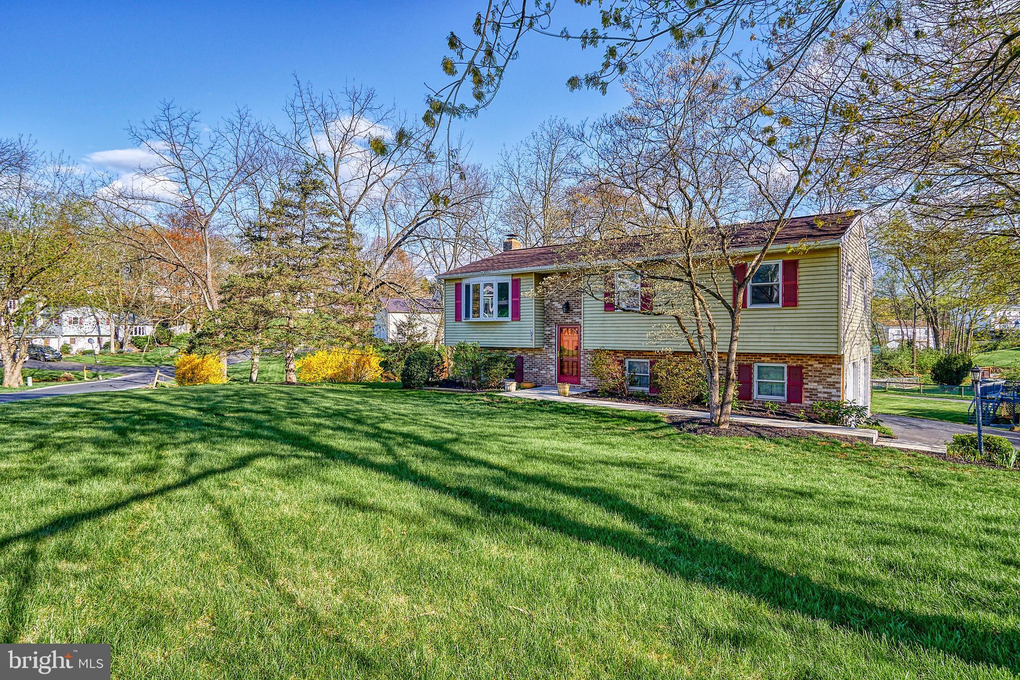 45 Sam Snead Circle Etters, PA 17319 - Photo 3 of 34 a view of a house with a big yard and large trees