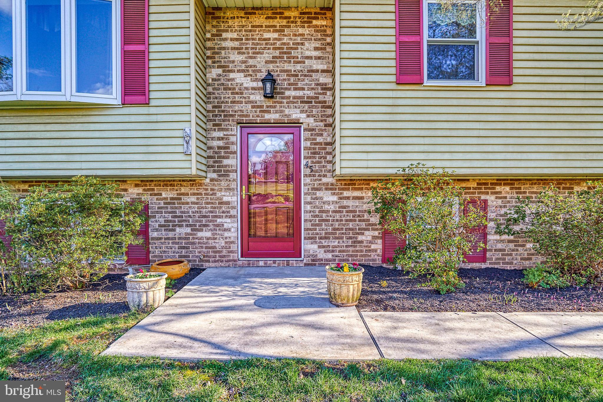 45 Sam Snead Circle Etters, PA 17319 - Photo 4 of 34 a front view of a house with a yard