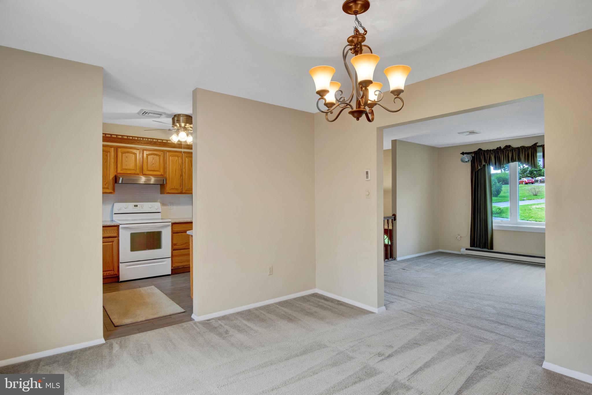45 Sam Snead Circle Etters, PA 17319 - Photo 10 of 34 a view of a hallway with a chandelier