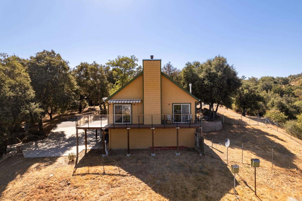 25770 East Grade Road Santa Ysabel, CA 92070 - Photo 54 of 75 a view of a house with a patio