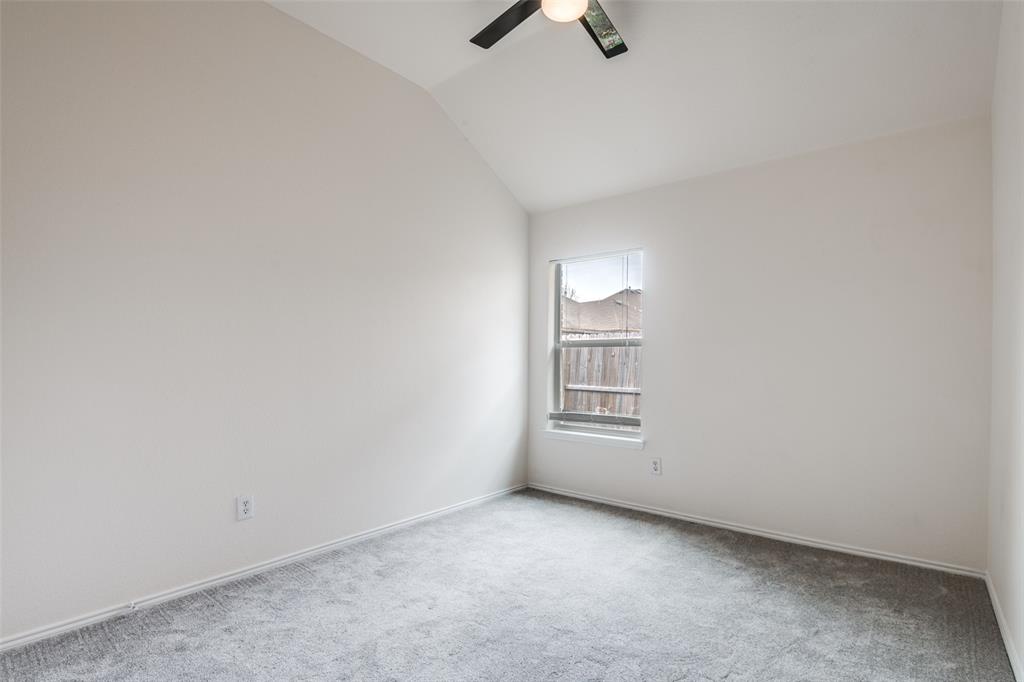 405 Hackberry Drive Fate, TX 75087 - Photo 19 of 24 an empty room with windows