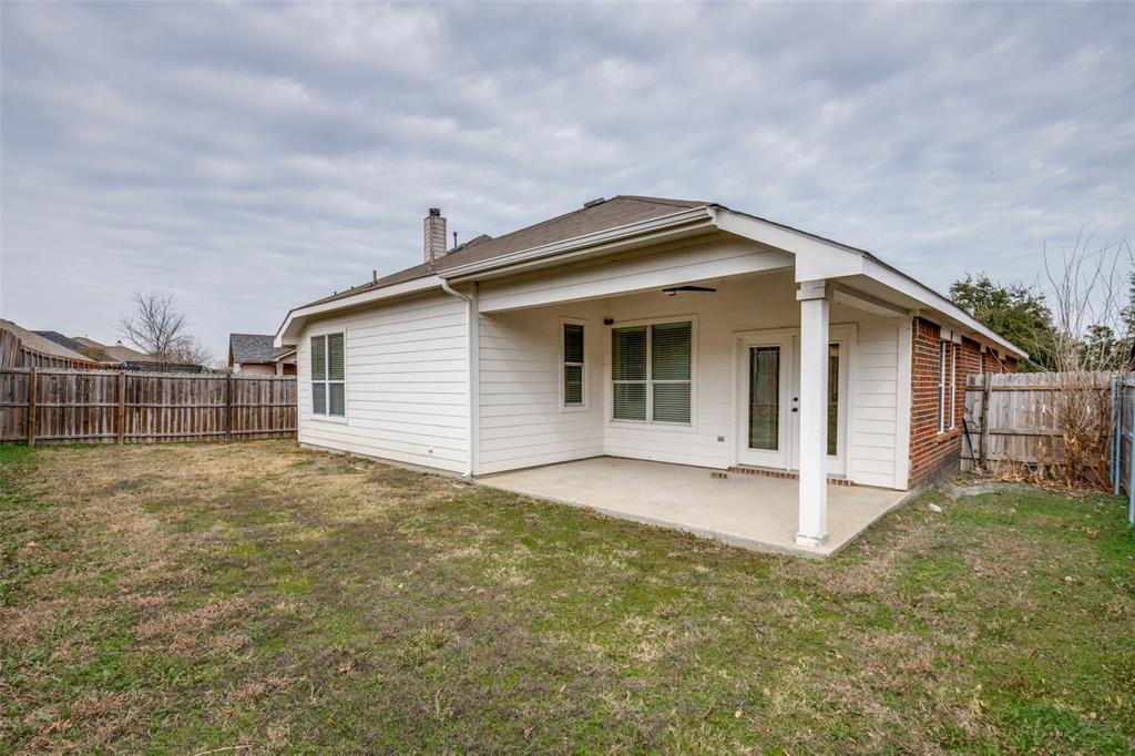 405 Hackberry Drive Fate, TX 75087 - Photo 23 of 24 a view of a house with backyard
