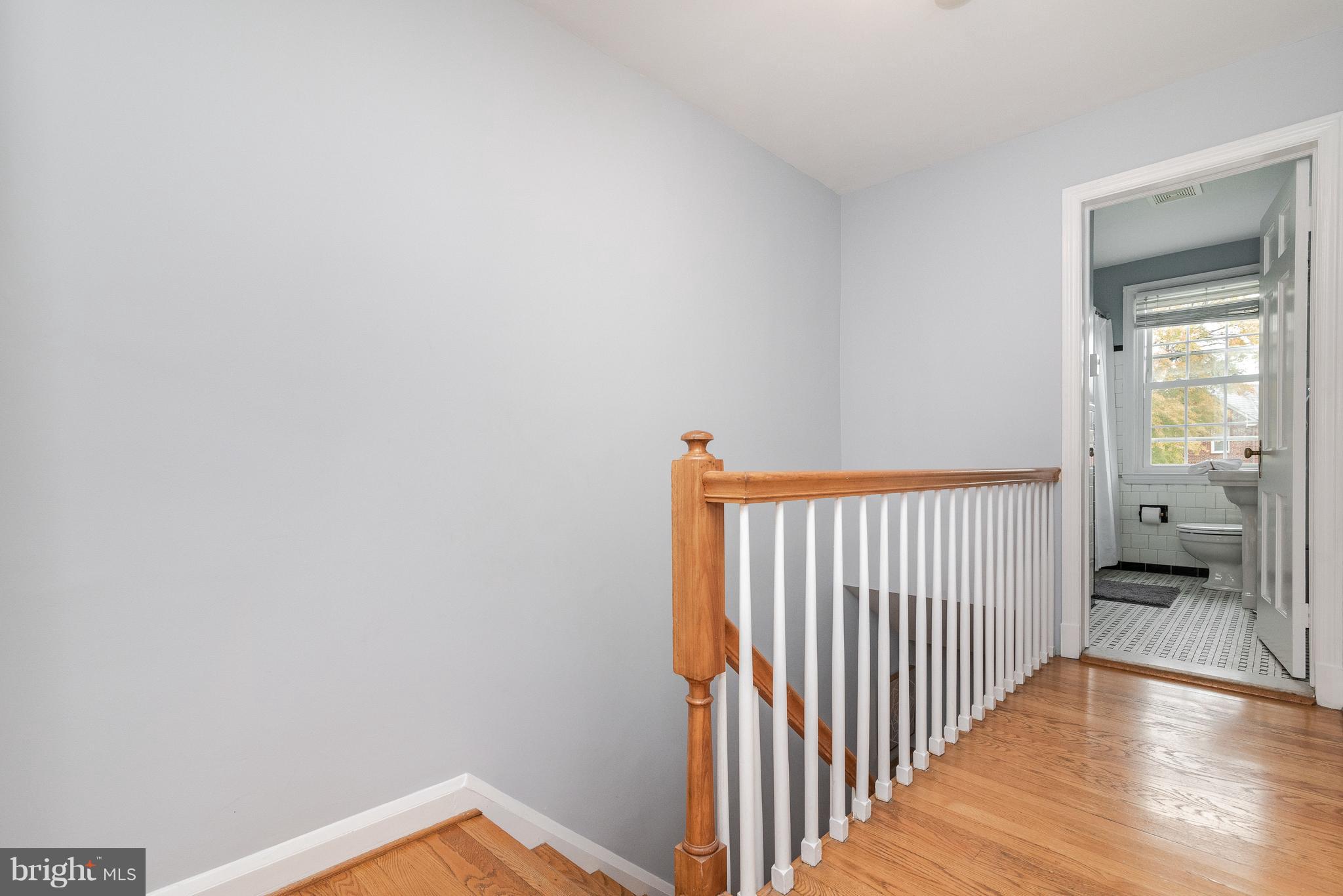 411 Lambeth Road Baltimore, MD 21228 - Photo 13 of 26 Pull-down attic stairway offers extra storage