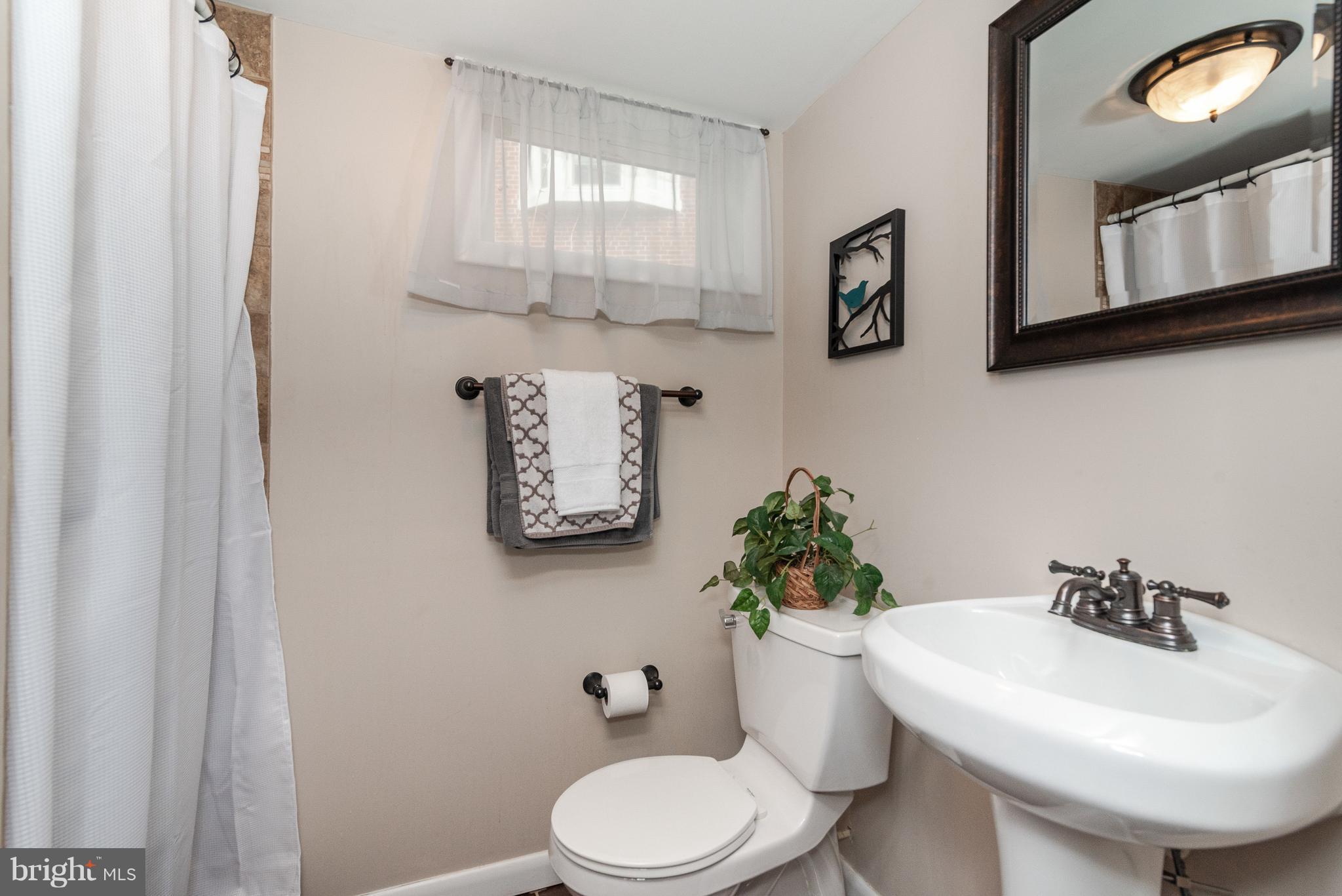 411 Lambeth Road Baltimore, MD 21228 - Photo 22 of 26 Custom tile shower in lower level Full Bath
