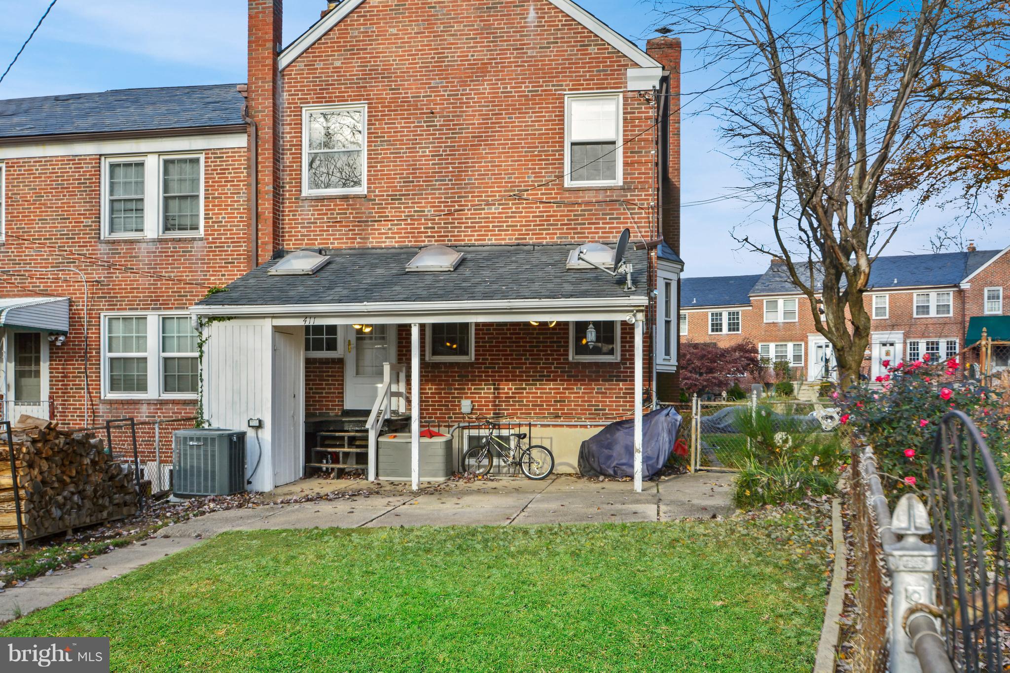 411 Lambeth Road Baltimore, MD 21228 - Photo 23 of 26 Fully fenced rear yard with covered patio
