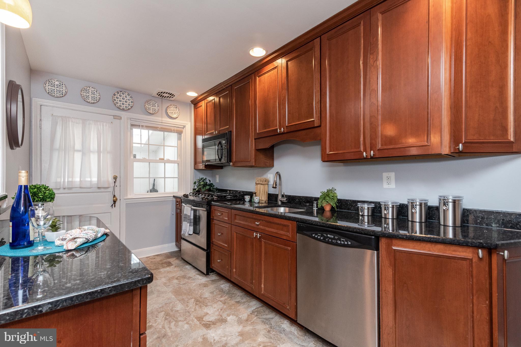 411 Lambeth Road Baltimore, MD 21228 - Photo 7 of 26 Storm door & updated flooring installed in 2018