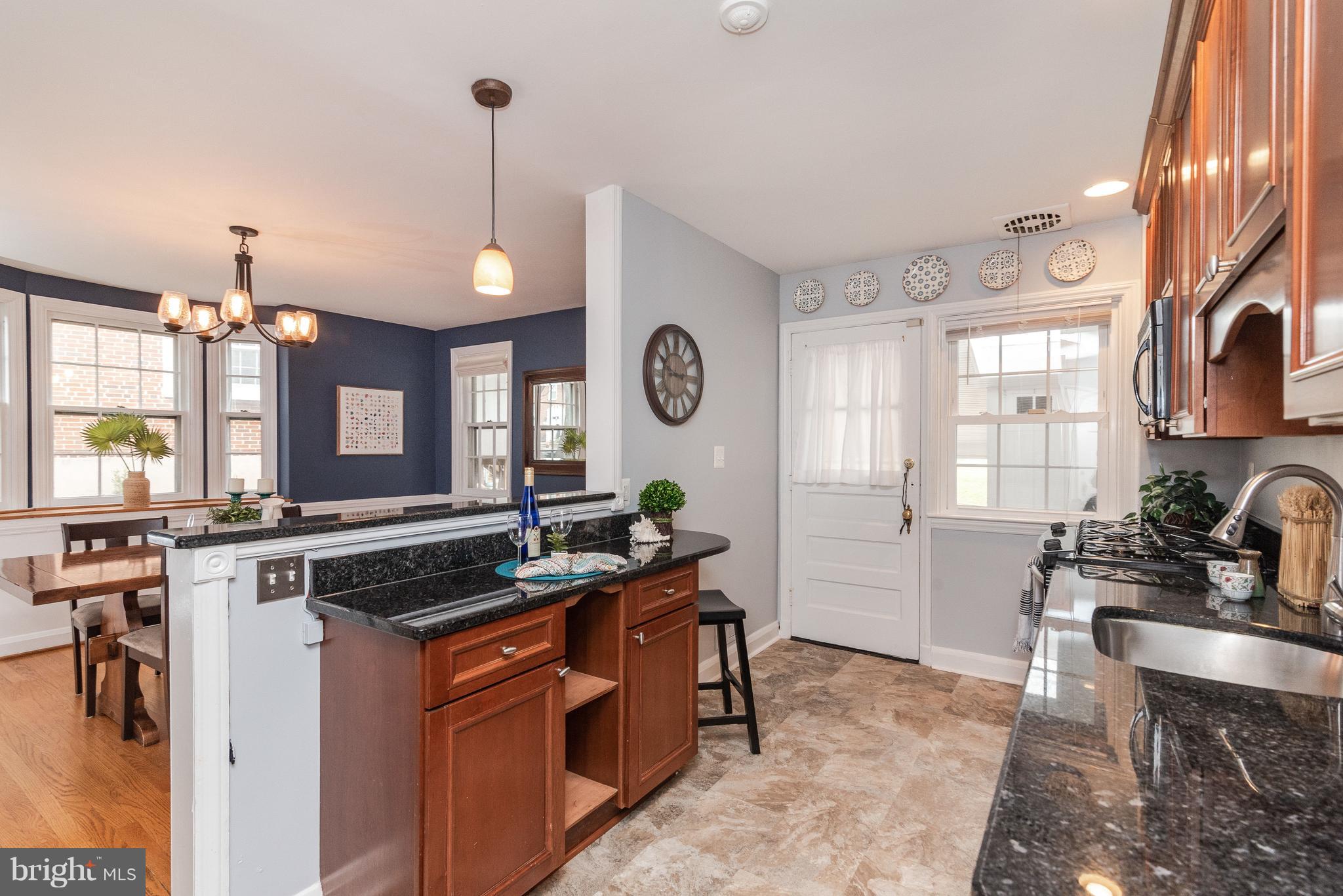 411 Lambeth Road Baltimore, MD 21228 - Photo 8 of 26 Open to Dining Room prep while you entertain!