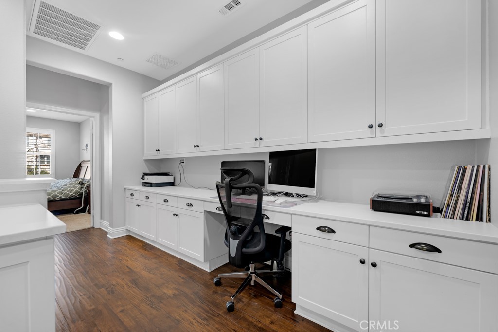 22104 Barrington Way Saugus, CA 91350 - Photo 18 of 31 a view of a workspace with furniture and a window