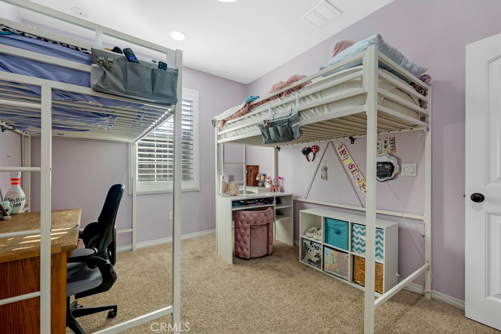 22104 Barrington Way Saugus, CA 91350 - Photo 21 of 31 a view of a room with gym equipment