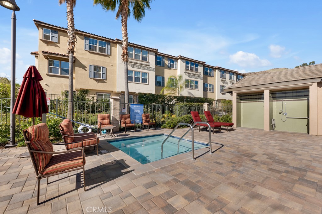 22104 Barrington Way Saugus, CA 91350 - Photo 26 of 31 a view of a house with backyard and porch