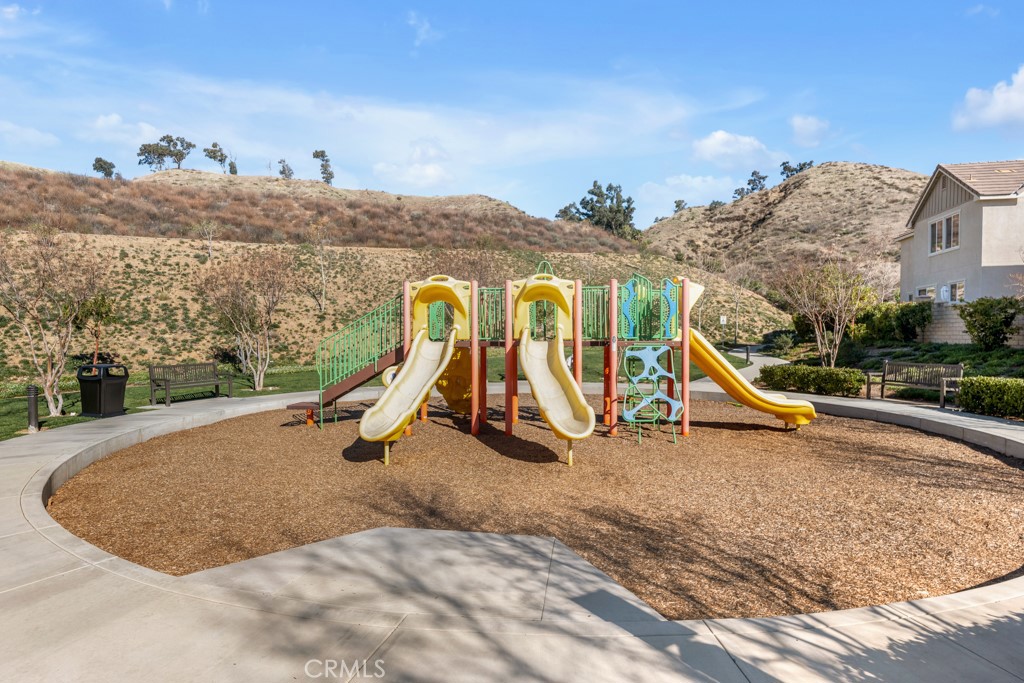 22104 Barrington Way Saugus, CA 91350 - Photo 28 of 31 a view of a park with slide
