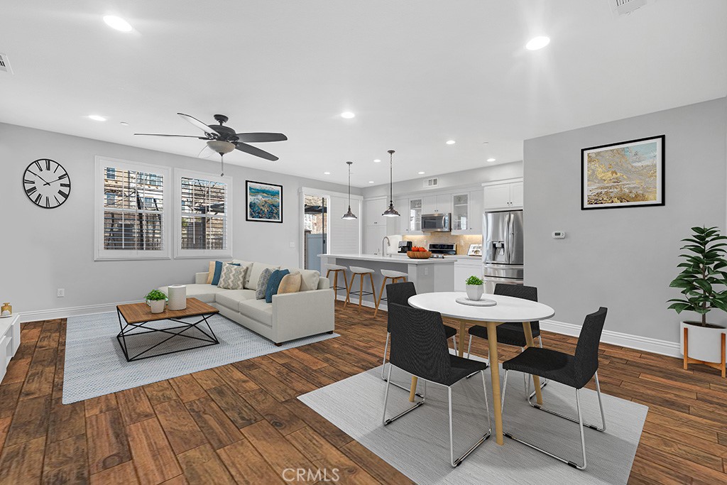 22104 Barrington Way Saugus, CA 91350 - Photo 3 of 31 a living room with furniture and kitchen view