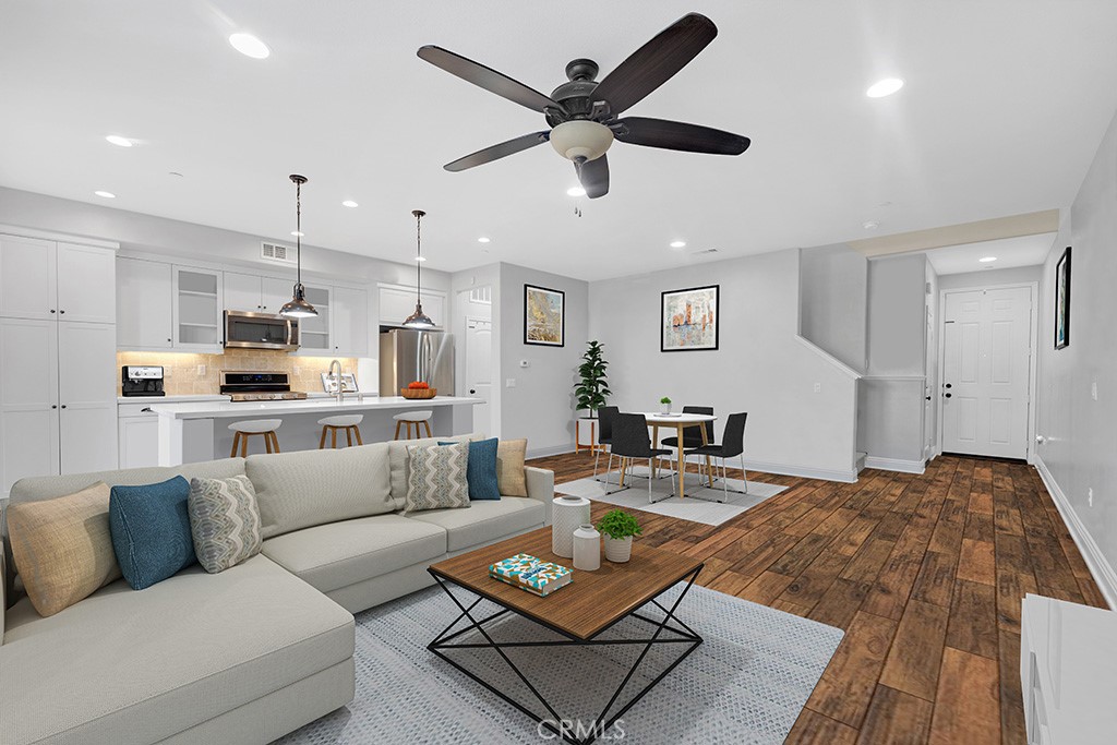 22104 Barrington Way Saugus, CA 91350 - Photo 4 of 31 a living room with furniture and kitchen view
