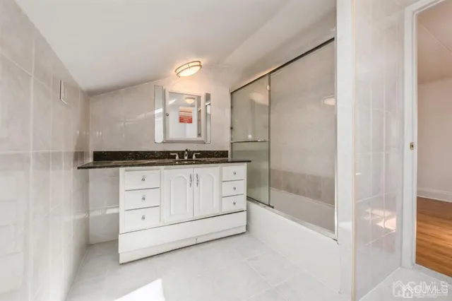 a room with cabinets and window