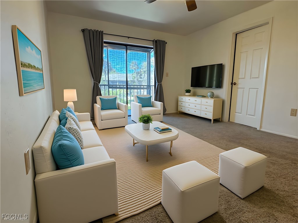 1211 Barrett Road, Unit 1106 North Fort Myers, FL 33903 - Photo 18 of 28 a living room with furniture and a flat screen tv