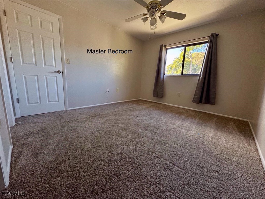 1211 Barrett Road, Unit 1106 North Fort Myers, FL 33903 - Photo 23 of 28 an empty room with a window