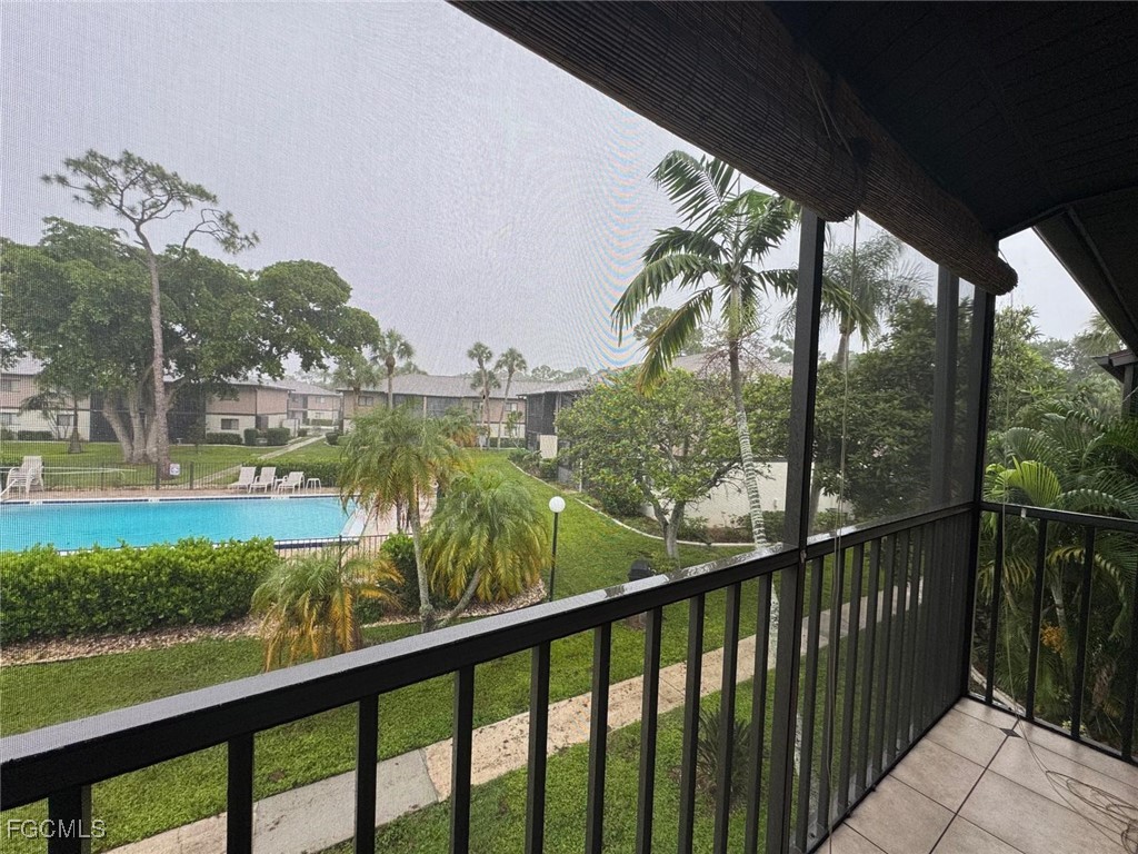1211 Barrett Road, Unit 1106 North Fort Myers, FL 33903 - Photo 24 of 28 a view of a balcony with lake view