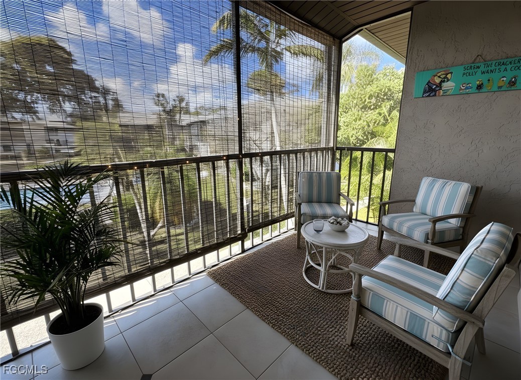 1211 Barrett Road, Unit 1106 North Fort Myers, FL 33903 - Photo 28 of 28 a view of balcony with couch