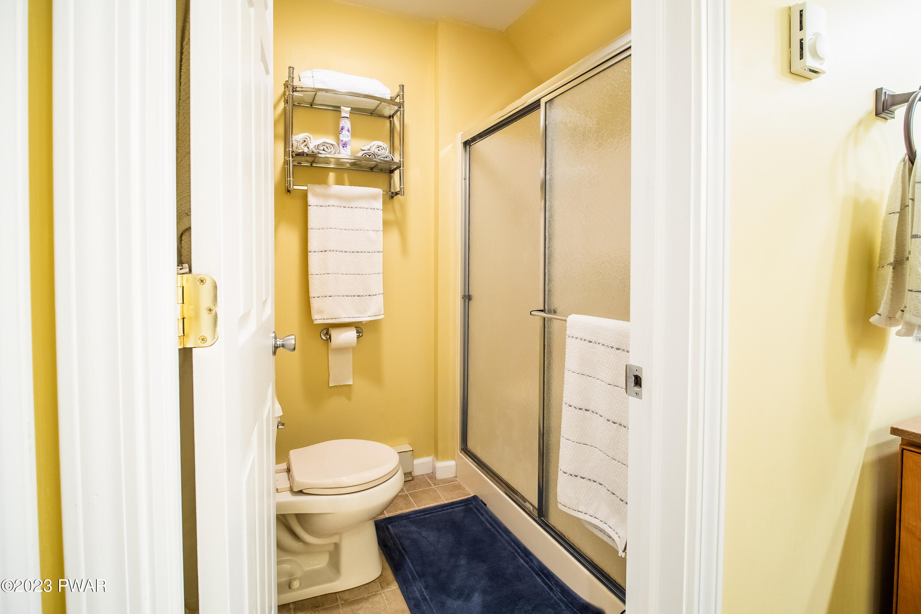 493 Northgate Road Lake Ariel, PA 18436 - Photo 27 of 37 a bathroom with a granite countertop shower a toilet and a sink