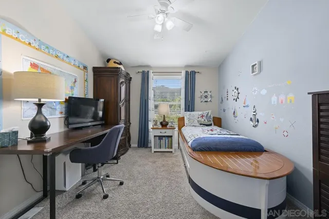 a view of a livingroom with furniture and wooden floor