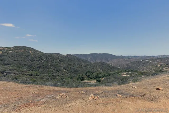 an aerial view of a house with garden space