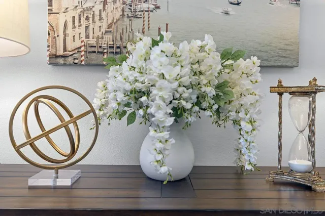 a vase of flowers sitting on a table