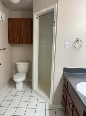 a view of room with wooden floor