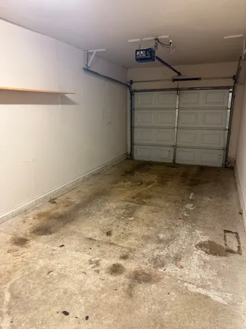 a bathroom with a toilet a sink and a mirror