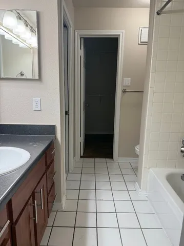 a balcony with trees in front of it