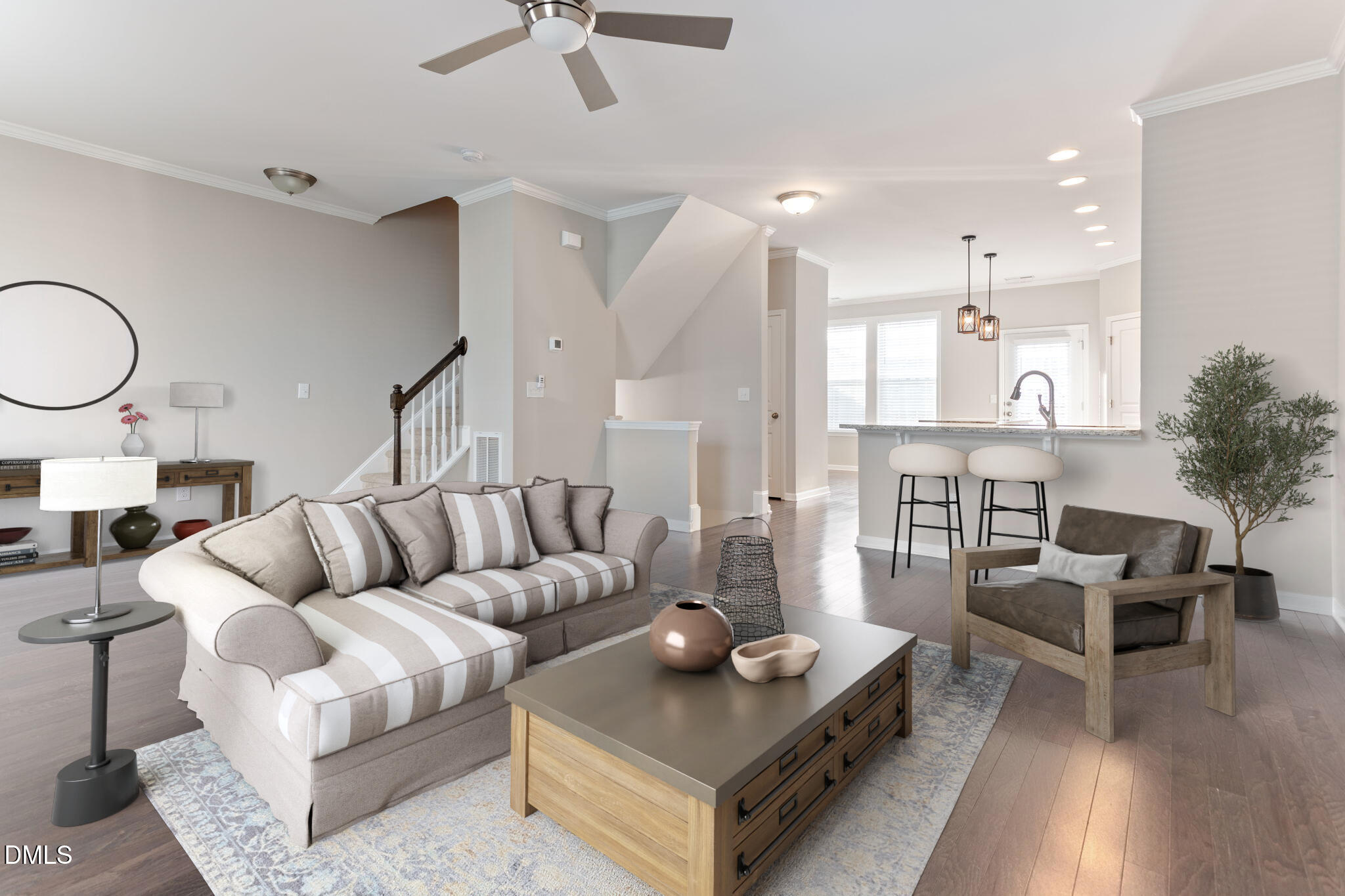5916 Giddings Street Raleigh, NC 27616 - Photo 6 of 49 a living room with furniture and a wooden floor