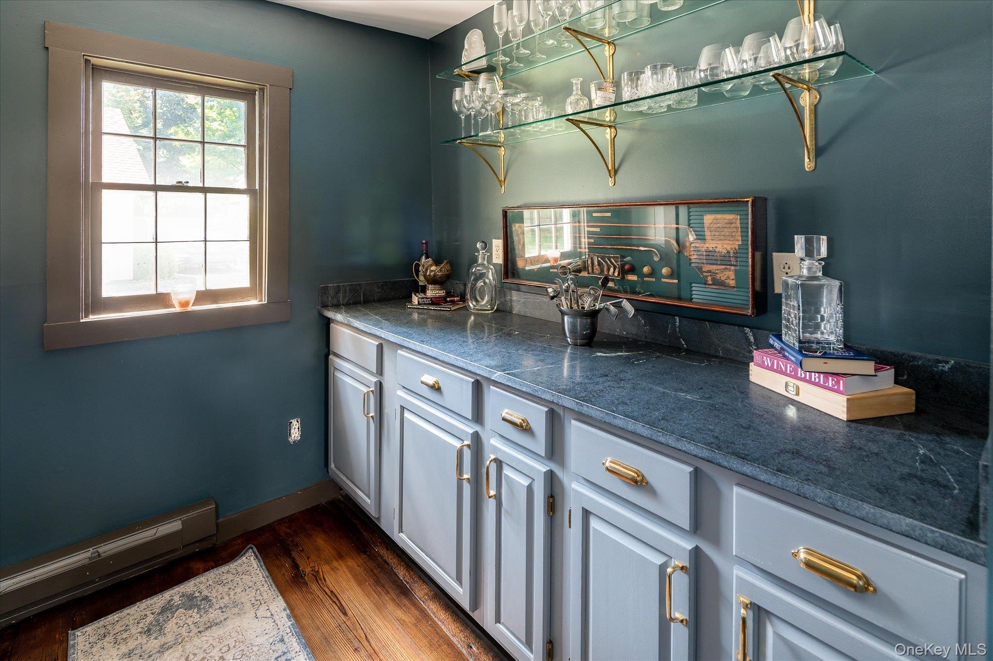 459 Old Post Road Bedford, NY 10506 - Photo 11 of 23 Bar area featuring open shelves and built-in cabinetry