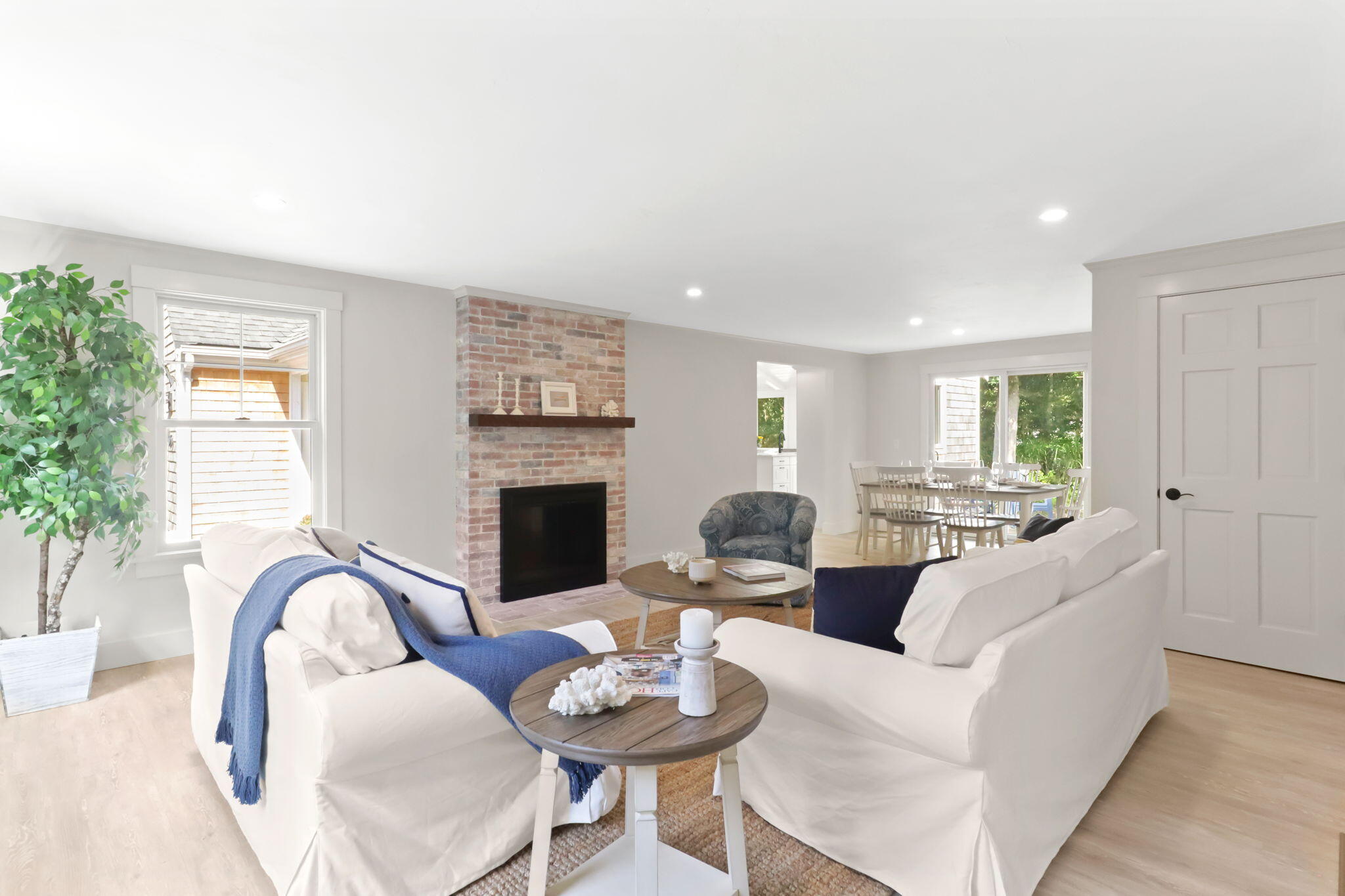 193 Northgate Road Chatham, MA 02633 - Photo 11 of 72 a living room with fireplace furniture and a fireplace