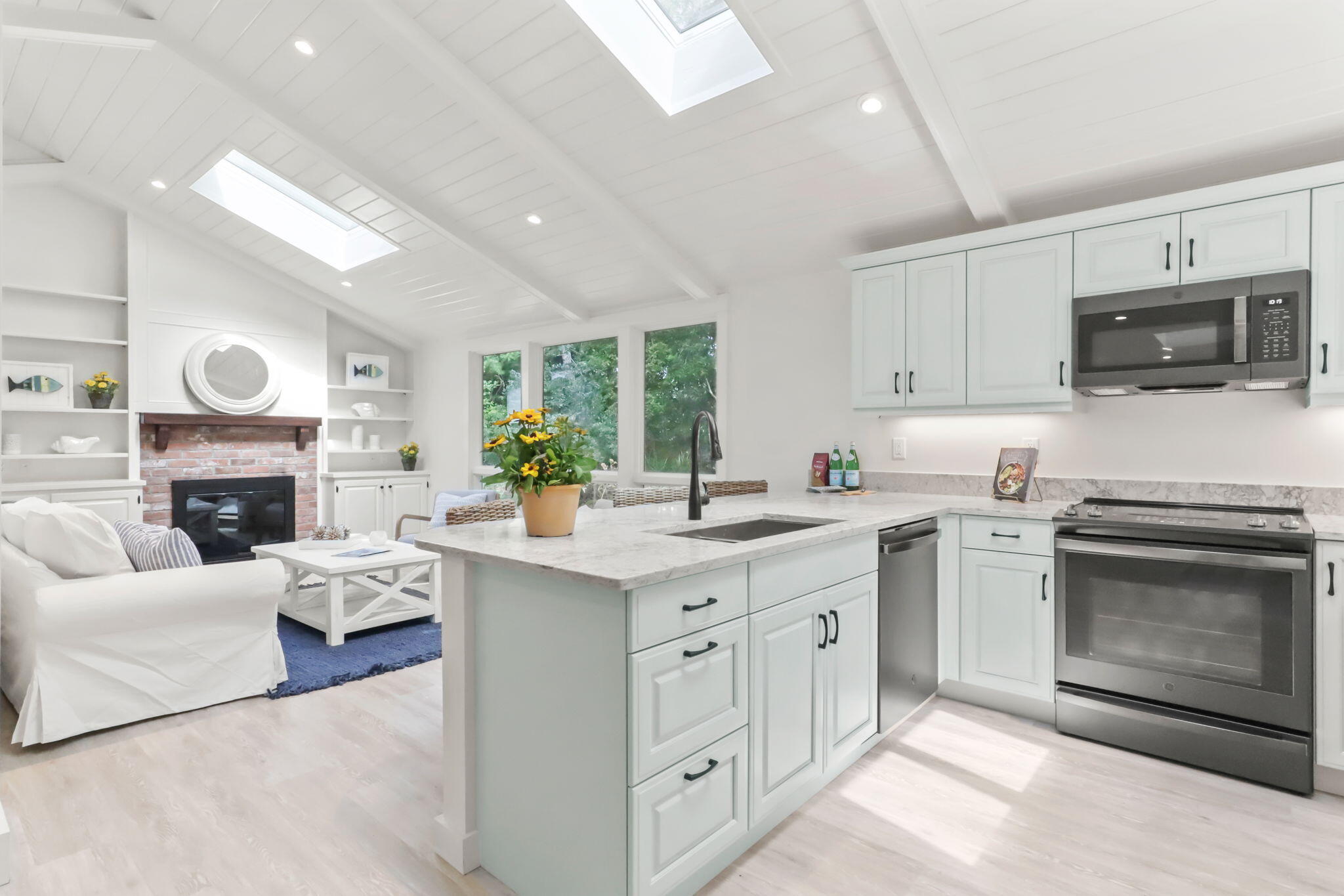 193 Northgate Road Chatham, MA 02633 - Photo 22 of 72 a kitchen with granite countertop a stove top oven sink and cabinets