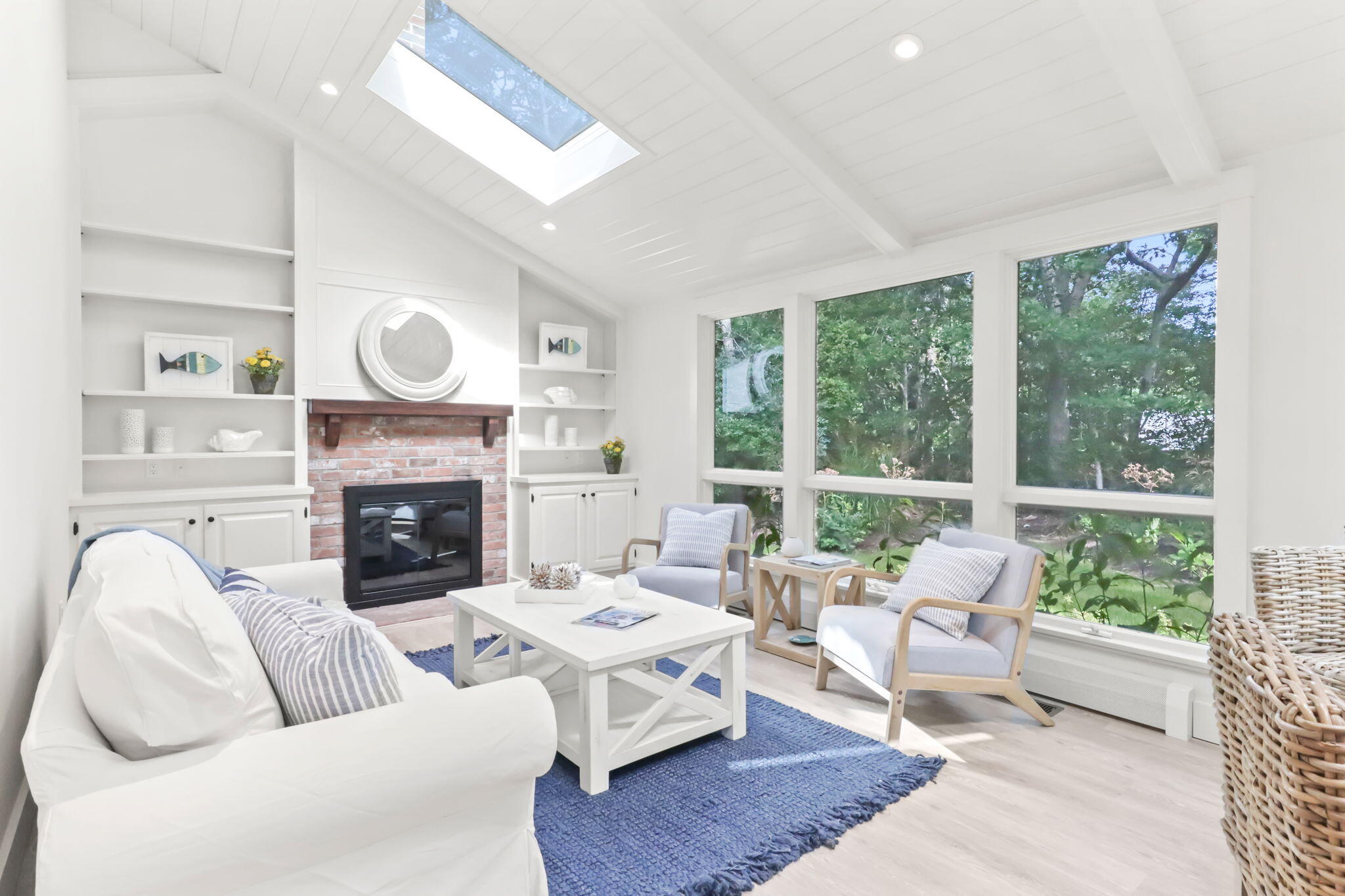 193 Northgate Road Chatham, MA 02633 - Photo 23 of 72 a living room with furniture and a fireplace