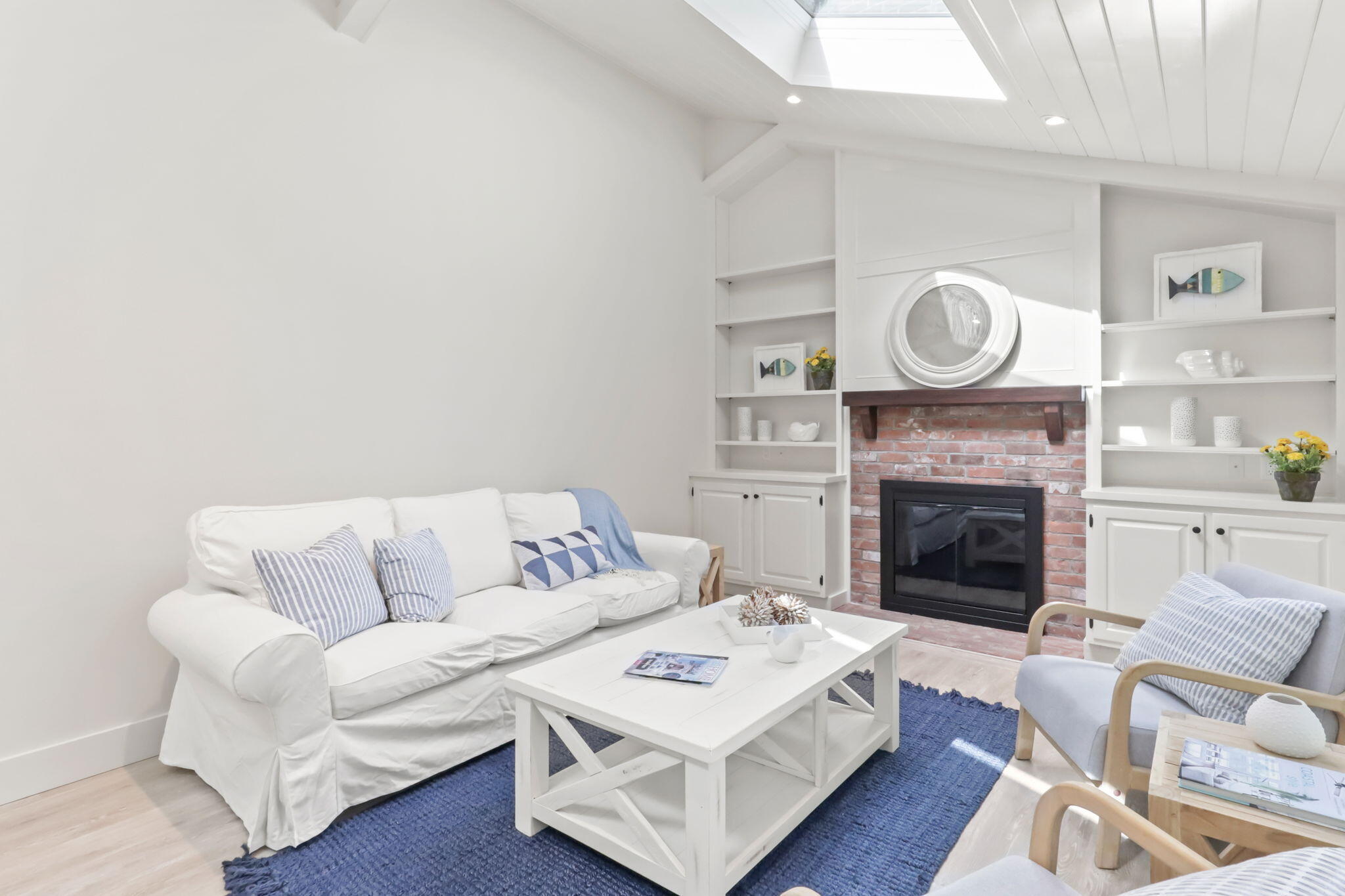 193 Northgate Road Chatham, MA 02633 - Photo 24 of 72 a living room with furniture and a fireplace
