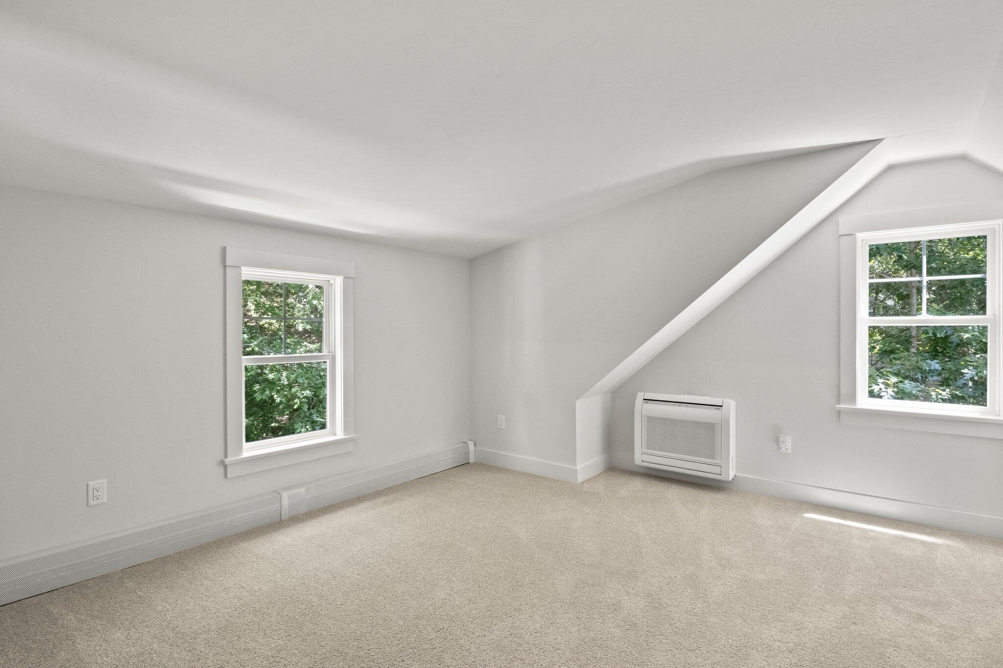 193 Northgate Road Chatham, MA 02633 - Photo 43 of 72 an empty room with windows and ceiling fan