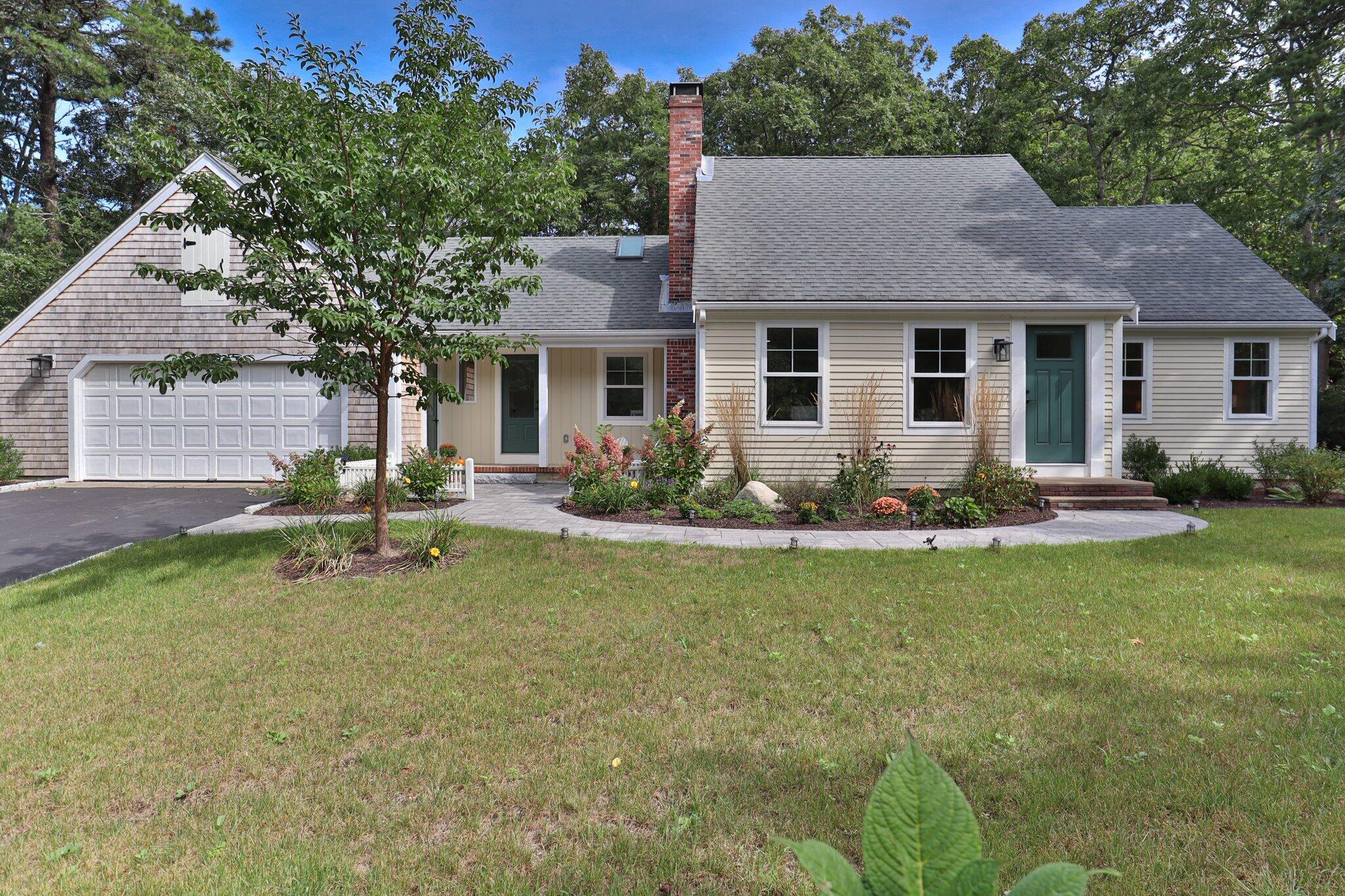 193 Northgate Road Chatham, MA 02633 - Photo 5 of 72 a front view of house with yard and outdoor seating