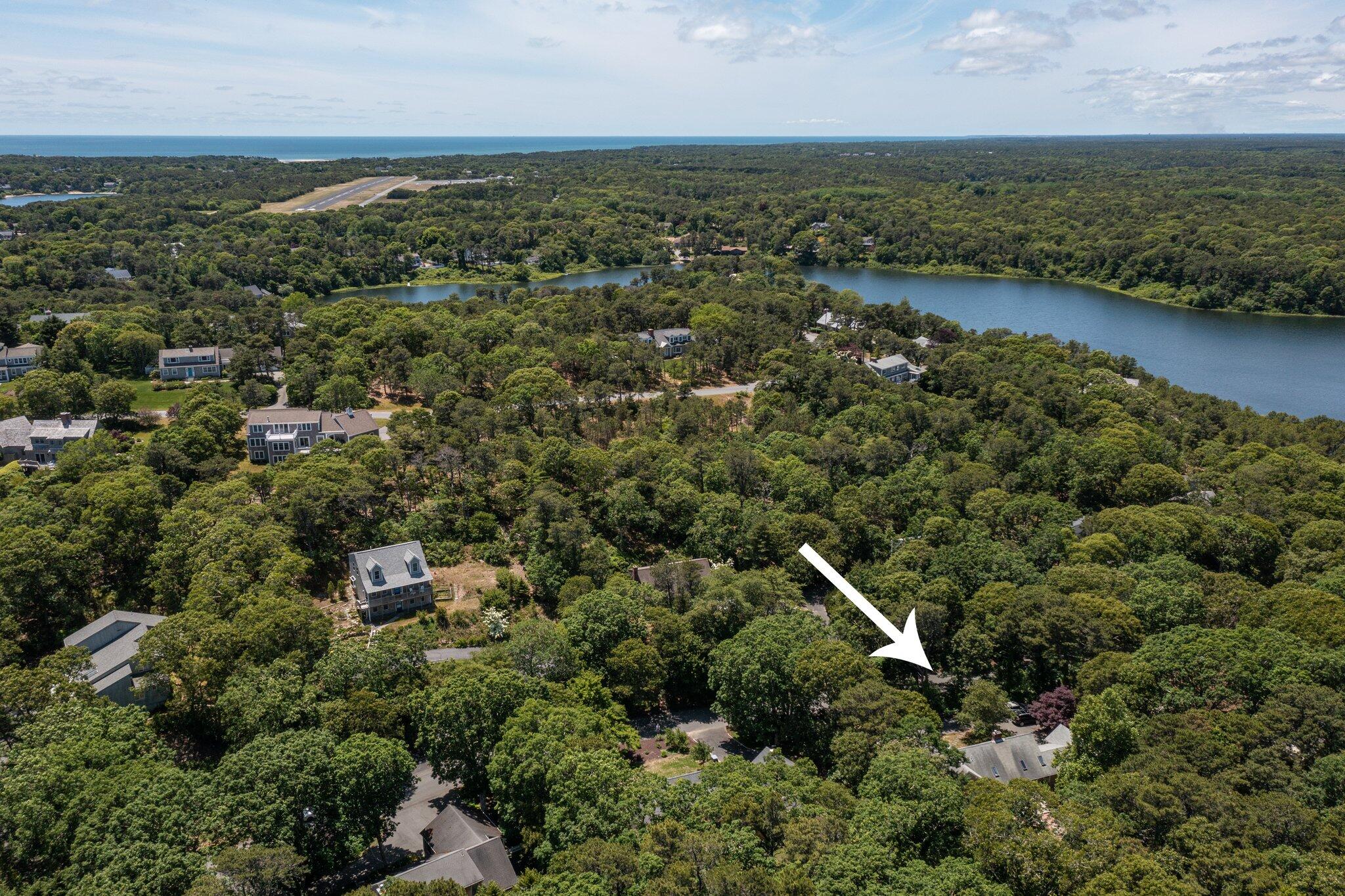 193 Northgate Road Chatham, MA 02633 - Photo 63 of 72 an aerial view of residential houses with outdoor space and lake view