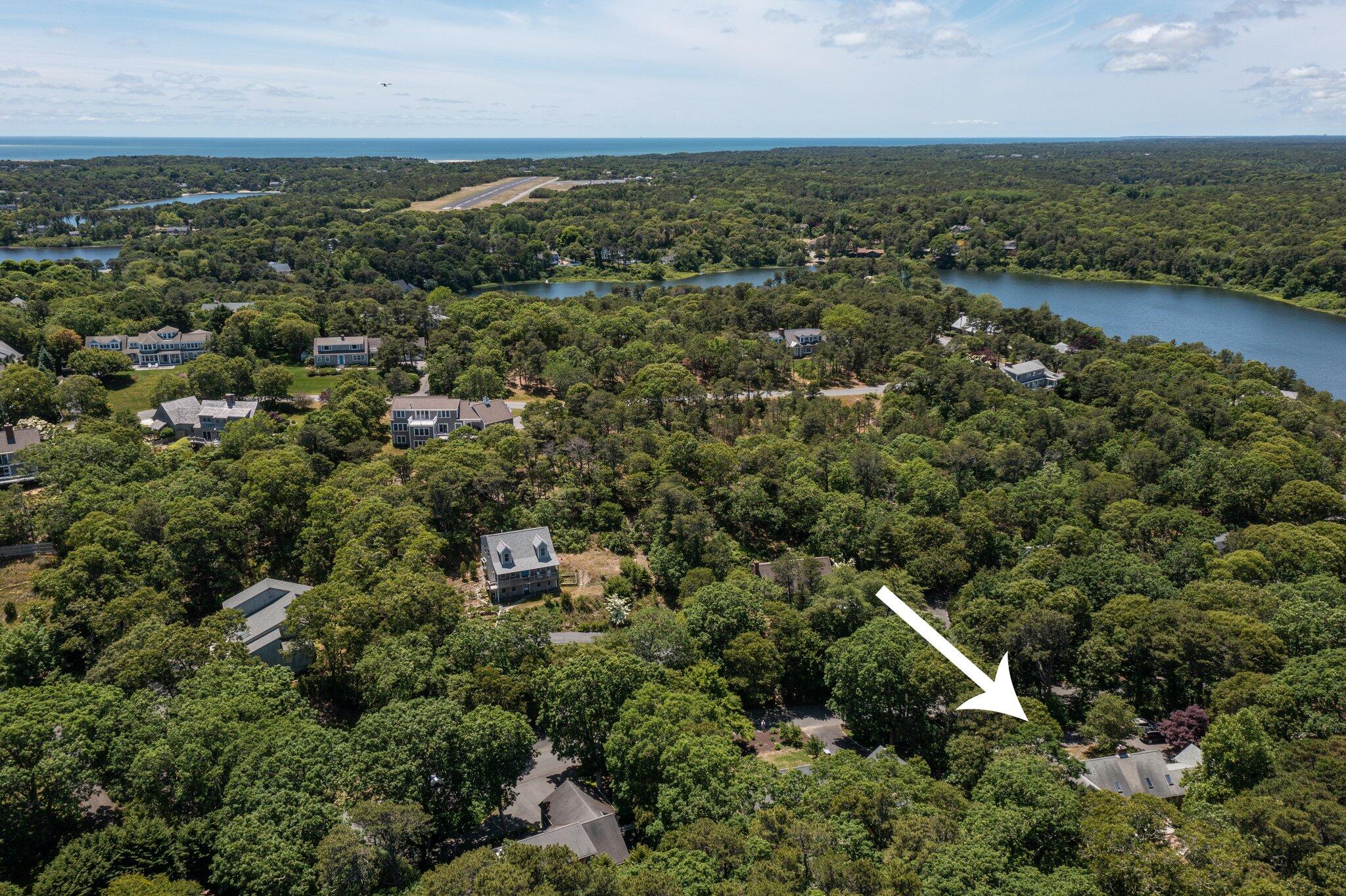 193 Northgate Road Chatham, MA 02633 - Photo 65 of 72 an aerial view of a city with lots of residential buildings