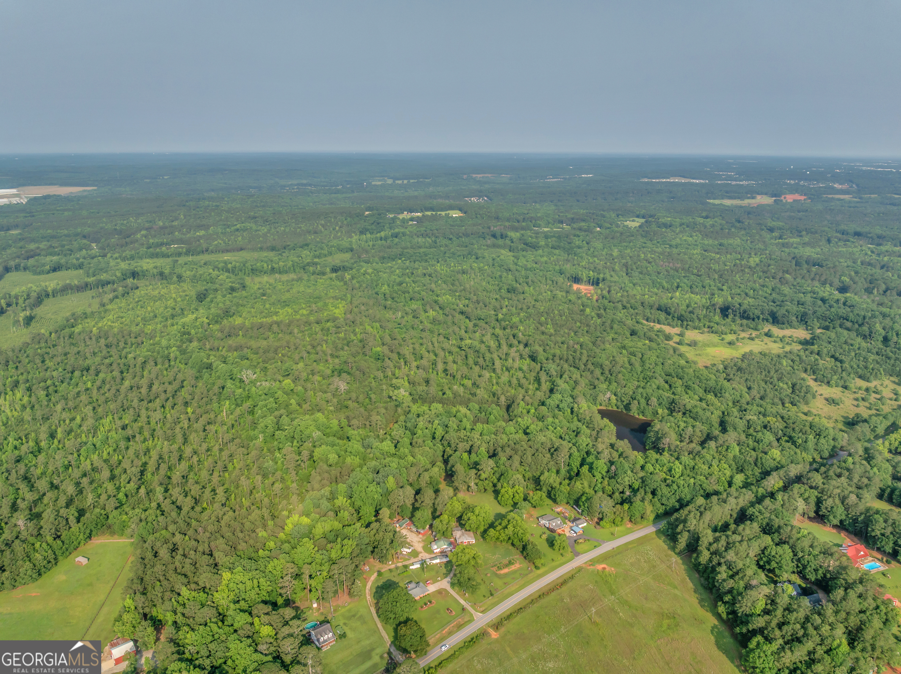 0 County Line Road Jenkinsburg, GA 30234 - Photo 7 of 24 a view of an outdoor space and a yard