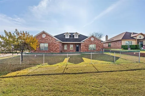a view of a house with swimming pool