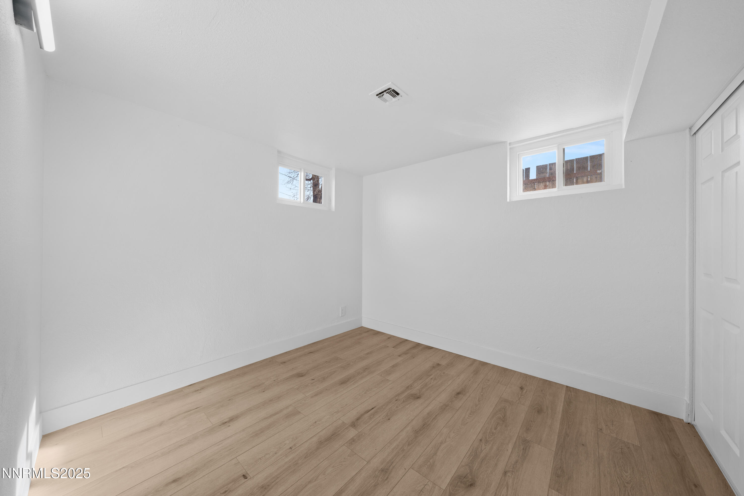 1620 Harold Drive Reno, NV 89503 - Photo 33 of 49 a view of empty room with wooden floor