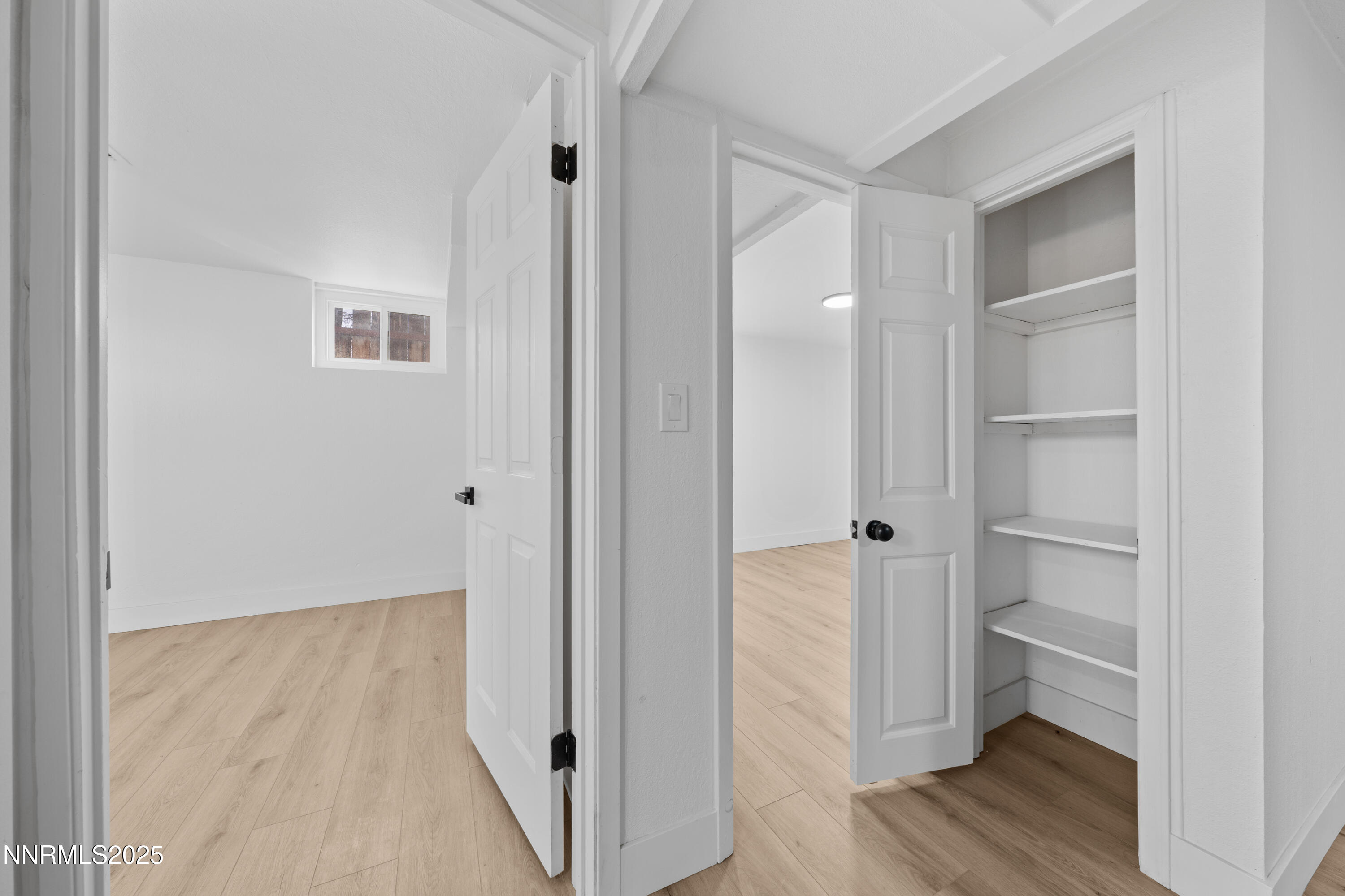 1620 Harold Drive Reno, NV 89503 - Photo 37 of 49 a view of a hallway with wooden floor
