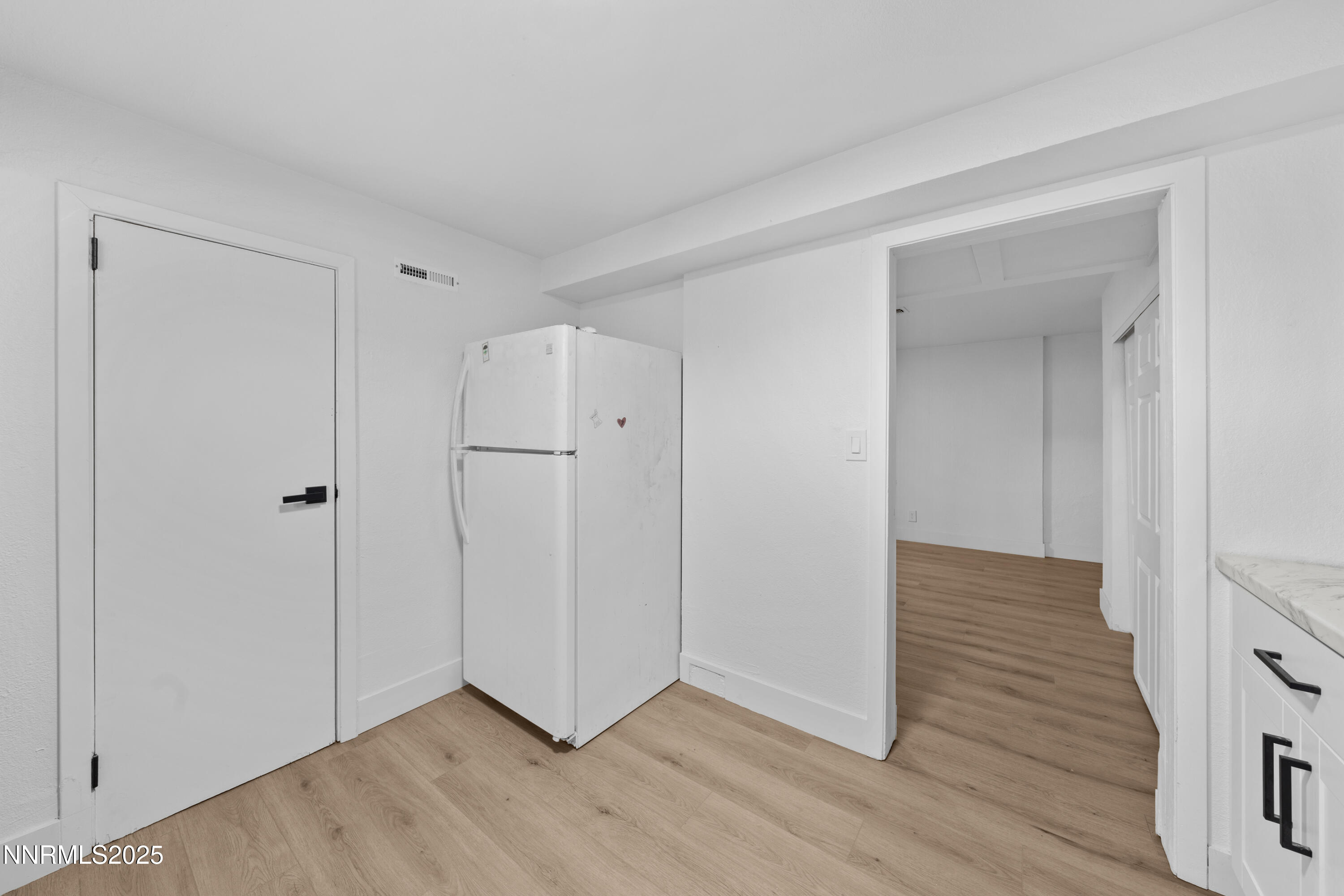 1620 Harold Drive Reno, NV 89503 - Photo 41 of 49 a view of an empty room with wooden floor and closet