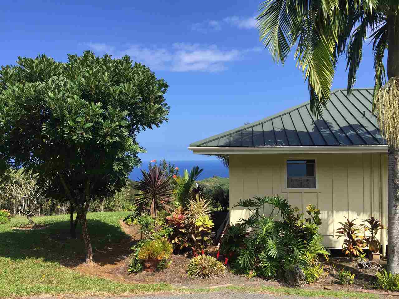 300 Hanauana Road Haiku, HI 96708 - Photo 27 of 30 a view of a house with a yard