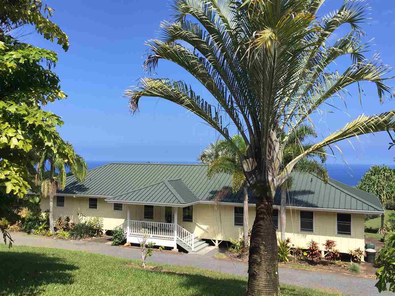 300 Hanauana Road Haiku, HI 96708 - Photo 3 of 30 a front view of a house with garden